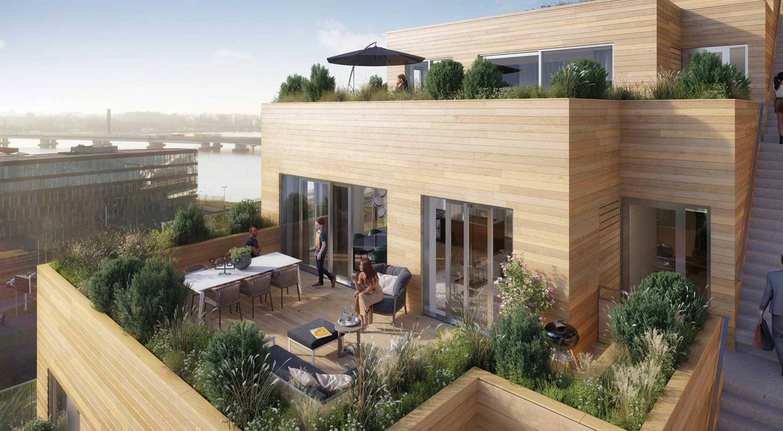 Project Sluishuis - Donker Design - Het terreinontwerp bestaat uit verblijfruimtes op de begane grond, plantenbakken op de privé- terrassen en een dakomloop met uitzichtpunt over het IJ